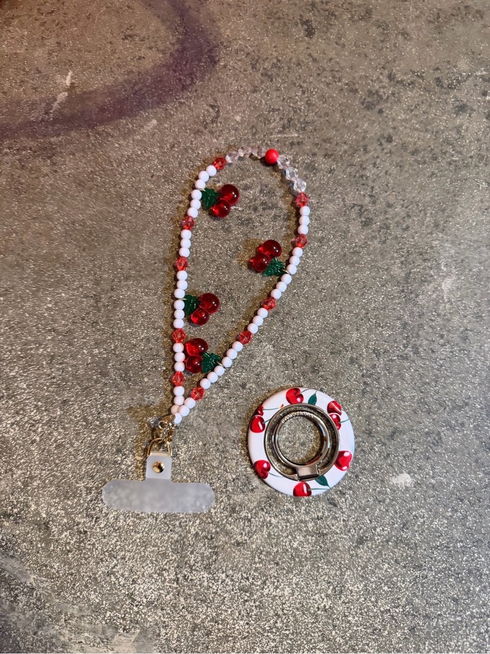 Phone charm/wristlet & magnetic phone grip/stand